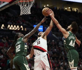 阿夫迪亚18+7克林根14+15 罗林斯36分开拓者击败雄鹿